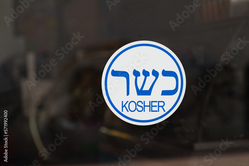 Kosher sign in a store window