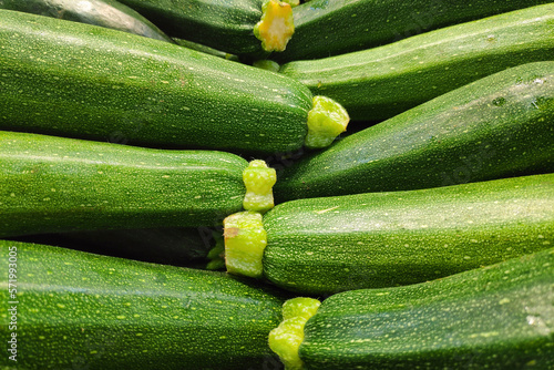 Fotografiet Stack of Zucchini on a market stall