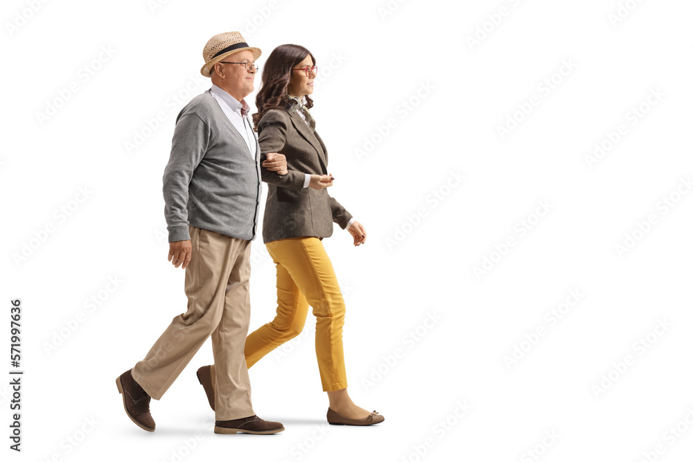 Elderly man holding a young woman under arm and walking Elderly man holding a young woman under arm and walking