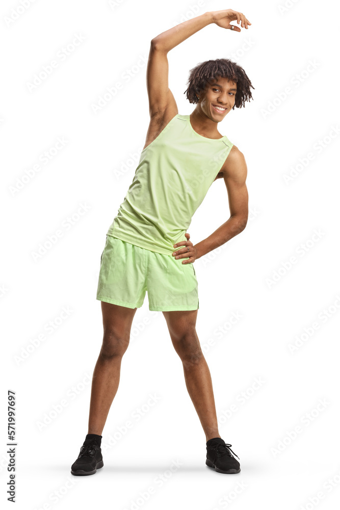 Full length portrait of an african american young man in sportswear exercising
