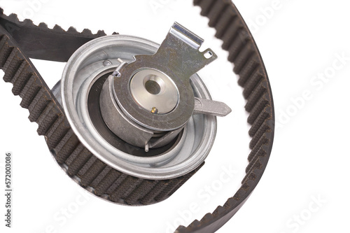 Automobile spare part. Close up repair kit: Timing belt, Tensioner pulley Deflection pulley. 