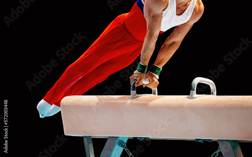 Schilderij op canvas gymnast athlete exercise on pommel horse in black background