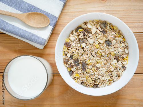 A Bowl of muesli breakfast and rolled oats with dried fruits