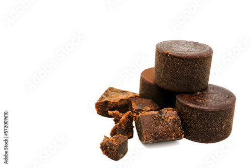 Palm sugar or in Indonesia also known as Gula Jawa or Gula Kelapa. Gula Jawa is sugar from coconut tree. Isolated on white background.