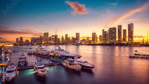 the skyline of miami during sunset with a marina © frank peters