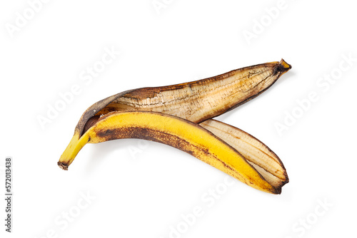 Overripe banana peel isolated on white background. One overripe banana close-up
