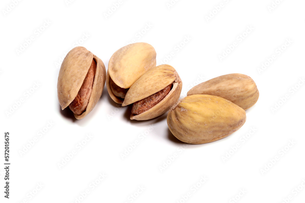 Shelled pistachios isolated on white background macro Shelled pistachios isolated on white background macro