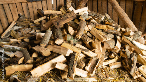 Firewood for the oven. Wood preparation. Chopping wood. Household. Cutting with an axe.