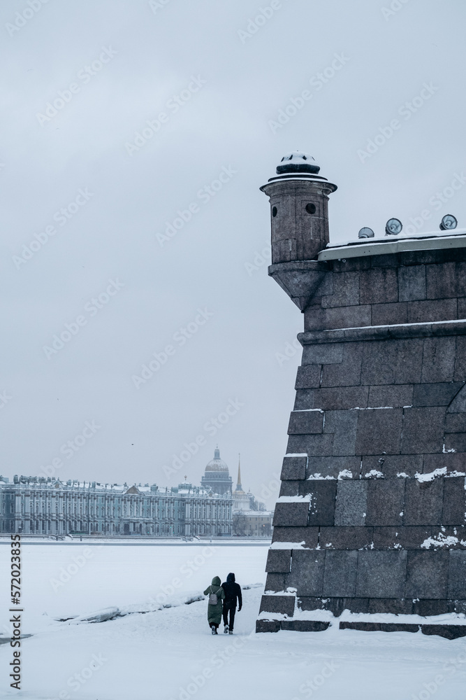 Fototapeta premium Snow-covered walls of an ancient fortress in winter.