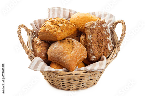 Basket with rolls from white and dark flour. Isolate on white background