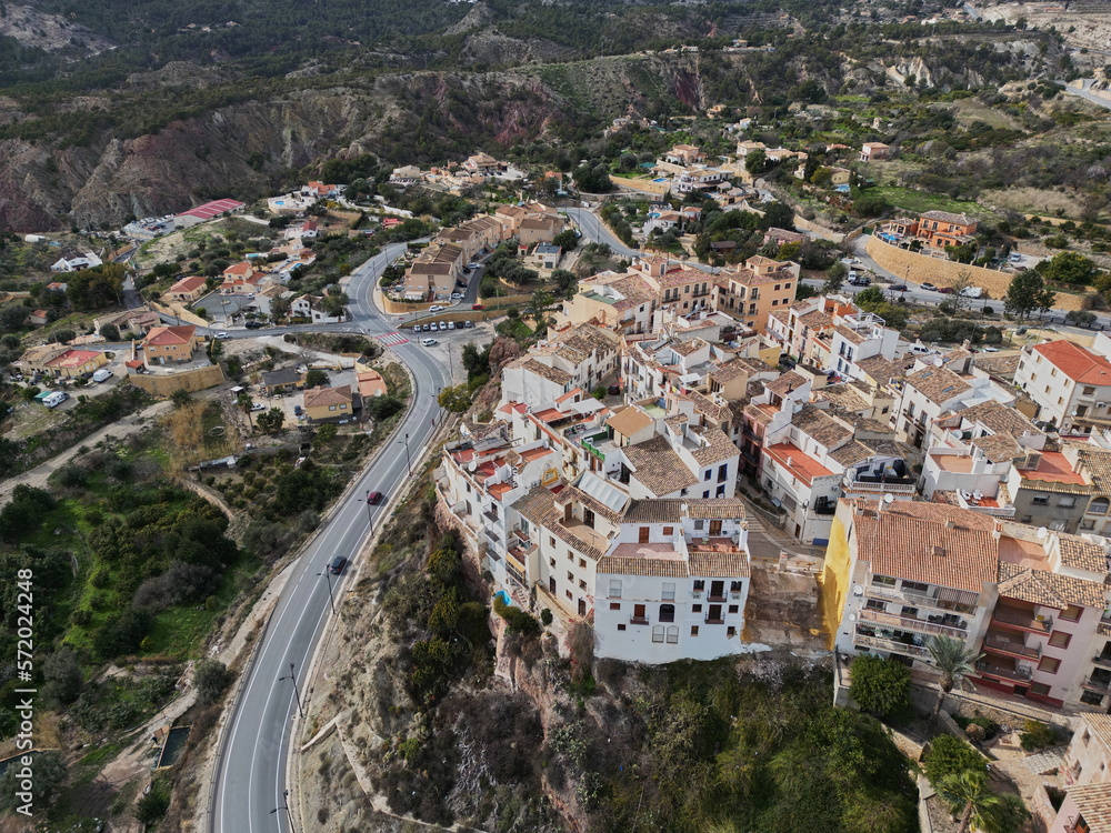 Top view of the Spanish city of Finestrat.Drone photo.Сity of Finestrat and the Puig Campana mountain.Costa Blanca,Spain 