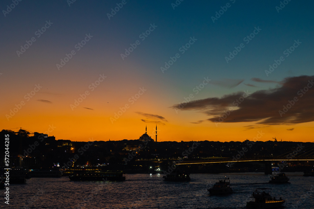 Istanbul view at sunset. Fatih Mosque and Golden Horn