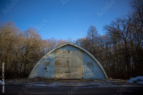 Old warehouse staying in forest