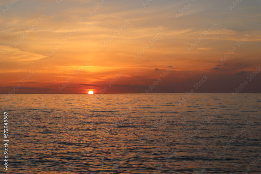 Sunset over the sea on the coast of Italy