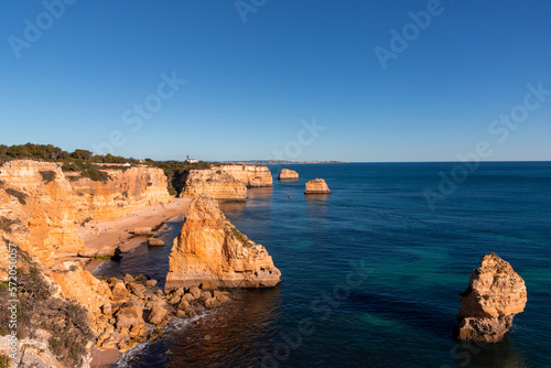 Landscape of the rocky coast in the Portimao area - Portugal photo