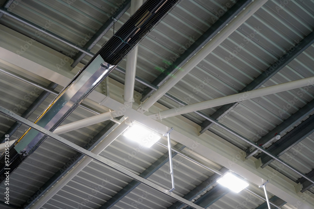Looking up at a roof of a sports hall Looking up at a roof of a sports hall