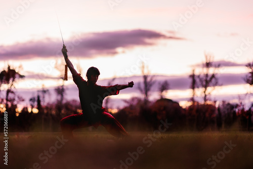 martial arts mid latin woman wushu kung-fu sword. healthy wellness active training. argentinean. © Sangiao_Photography