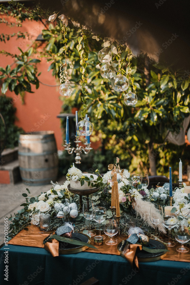 Rustic decoration with flowers and candles. 