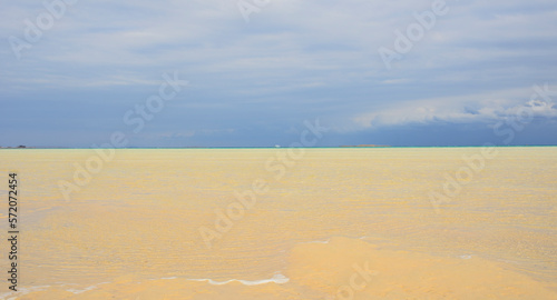 sandy beach and blue sky for banner background