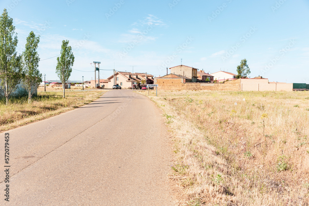 Obraz premium Camino Frances (French Way) - paved road entering Villamarco, province of León, Castile and Leon, Spain - June 2022