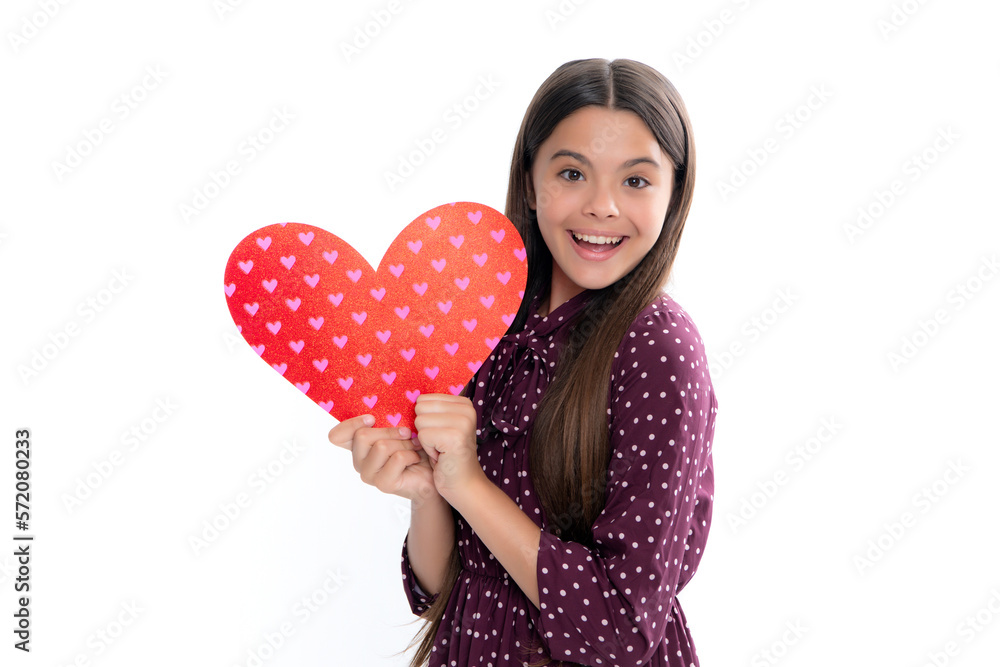 Young teenager child girl with heart shape. Happy Valentines Day. Love and pleasant feelings concept. Portrait of happy smiling teenage child girl. Young teenager child girl with heart shape. Happy Valentines Day. Love and pleasant feelings concept. Portrait of happy smiling teenage child girl.