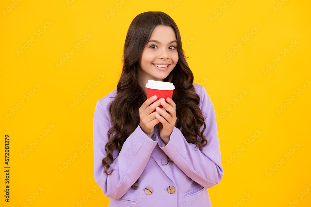 Kid girl 12, 13, 14 years old with take away cup of cappuccino coffee or tea. Child with takeaway mug on yellow background, morning drink beverage. Happy face, positive and smiling girl. Kid girl 12, 13, 14 years old with take away cup of cappuccino coffee or tea. Child with takeaway mug on yellow background, morning drink beverage. Happy face, positive and smiling girl.