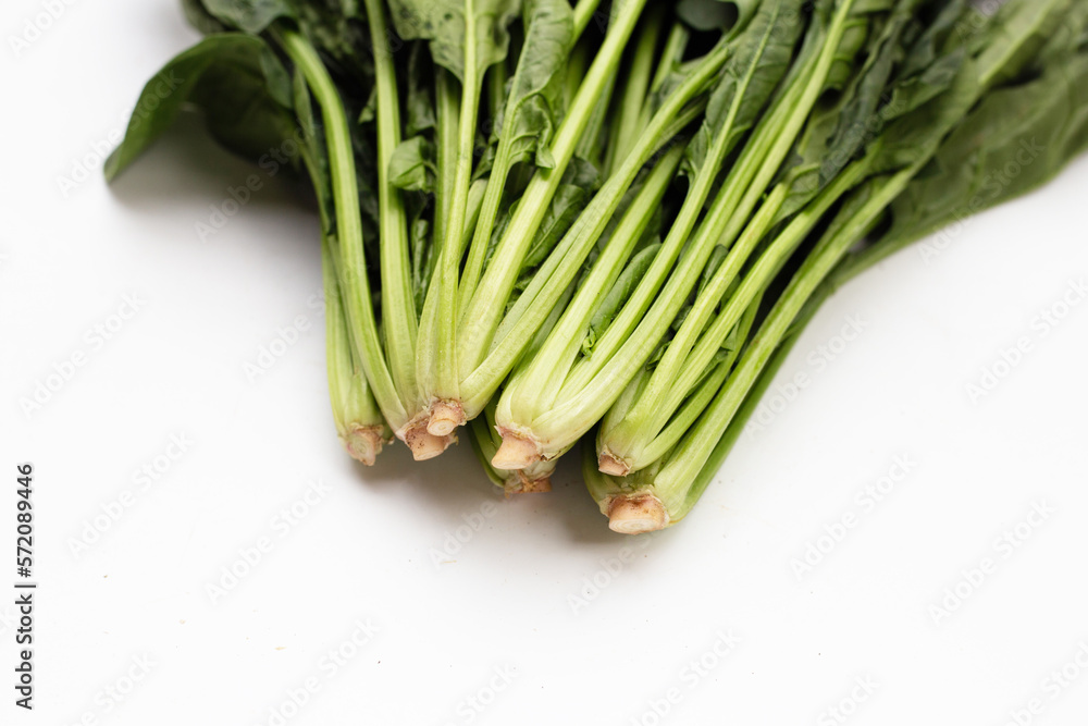 Fresh spinach on white background Fresh spinach on white background