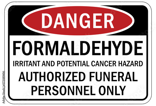 Formaldehyde chemical warning sign and labels irritant and potential cancer hazard. Authorized funeral personnel only