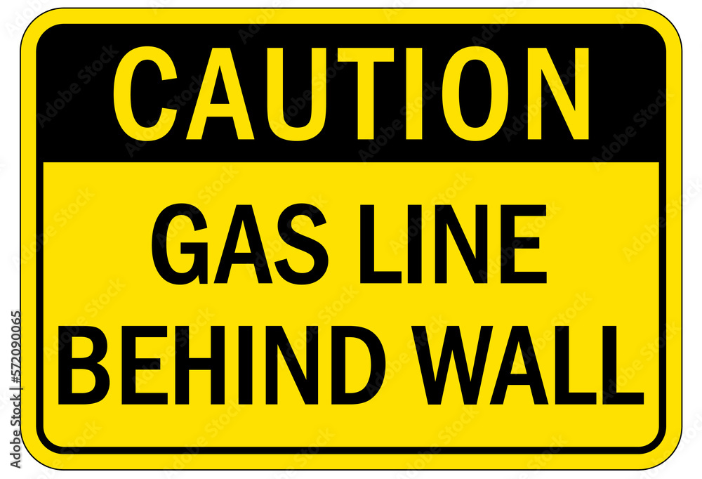 Pipeline sign and labels gas line behind wall Pipeline sign and labels gas line behind wall