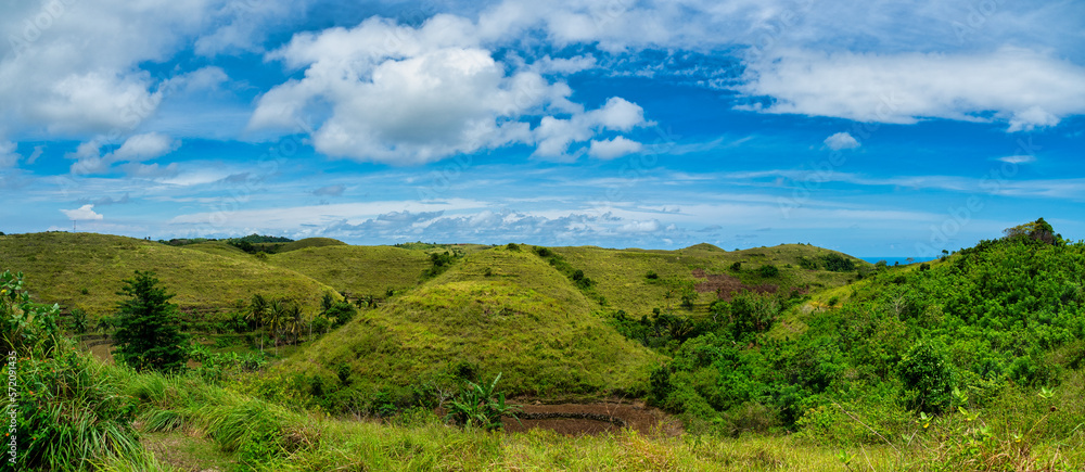 Teletubbies Hill located in the village of Tanglad, Nusa Penida Subdistrict, Bali Teletubbies Hill located in the village of Tanglad, Nusa Penida Subdistrict, Bali