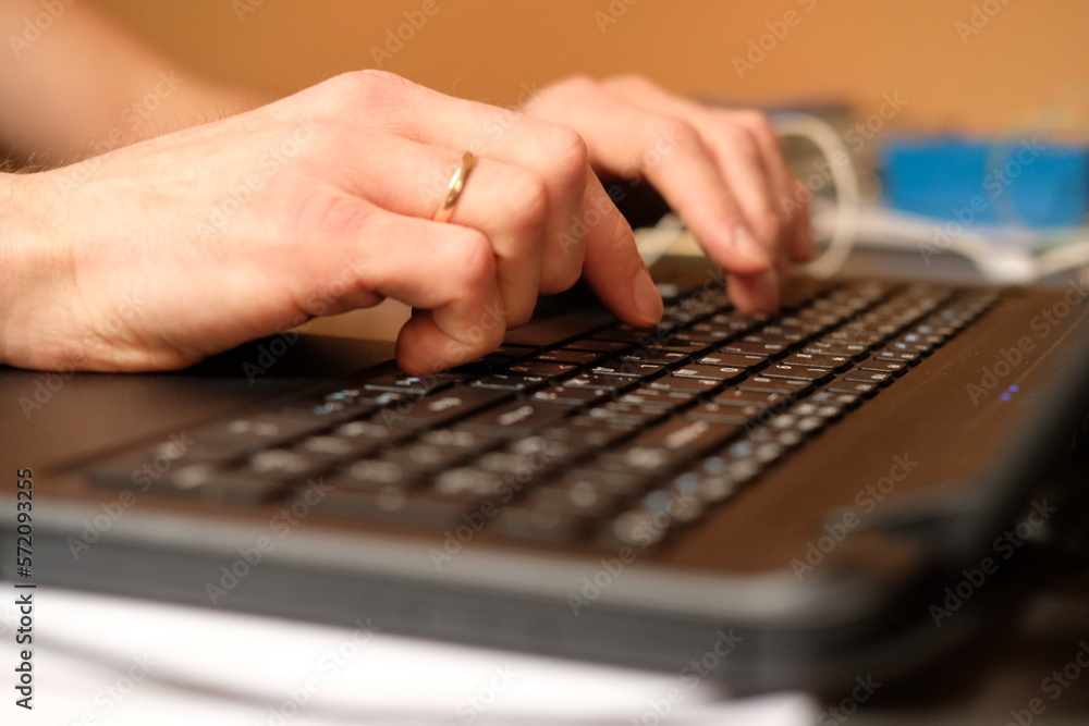 Image of man's hands typing. Selective focus Image of man's hands typing. Selective focus