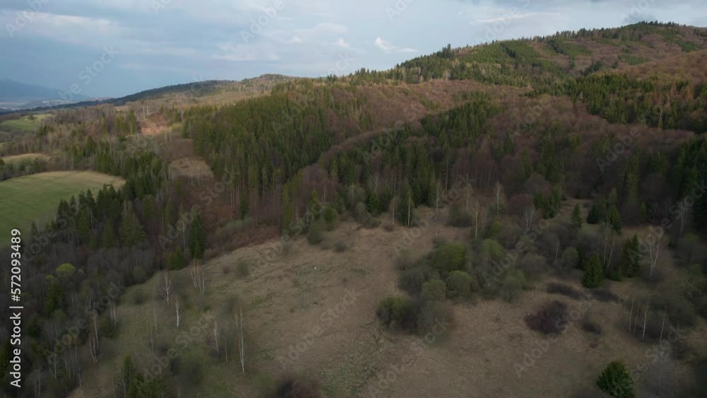 Aerial establishing shot of the dense woodlands at the lower Tatras Mountains, Slovakia Aerial establishing shot of the dense woodlands at the lower Tatras Mountains, Slovakia