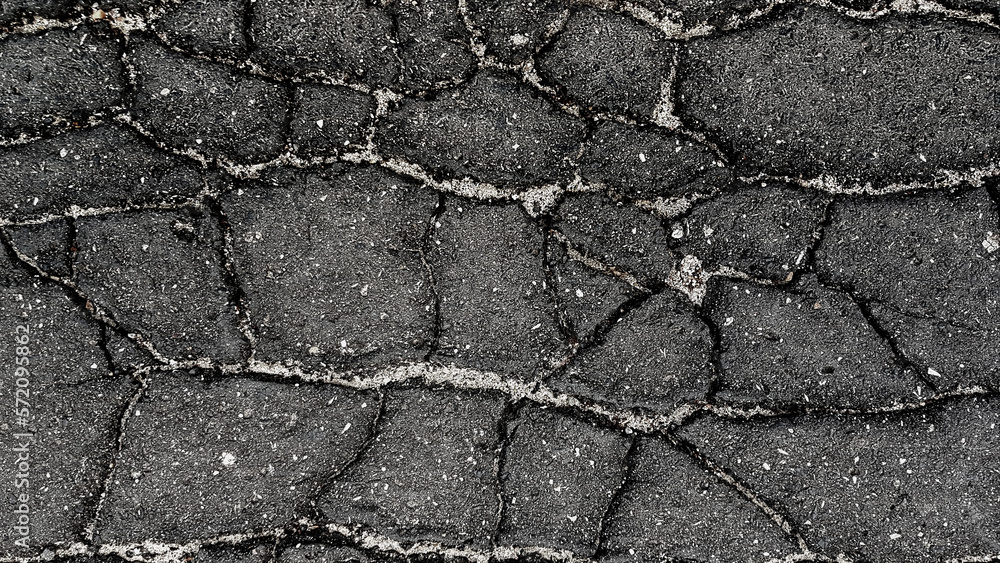 Obraz premium Black cracked asphalt texture