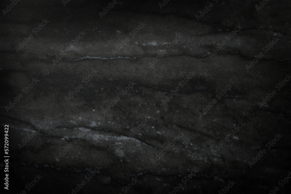 Texture of black marble surface as background, closeup