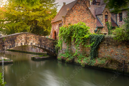 Obraz na płótnie Flemish and ornate architecture of idyllic Bruges with canal, Flanders, Belgium w salonie