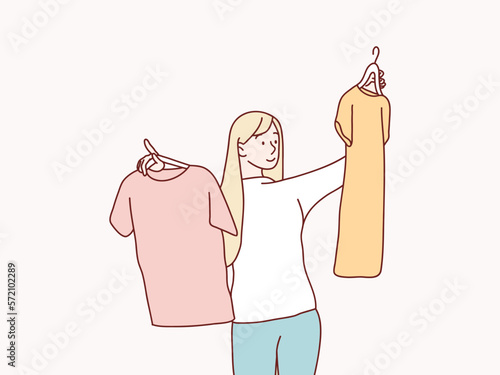 Woman pick her fashion outfit after the shopping simple korean style illustration