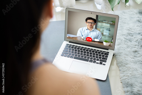 Young businesswomen working on her laptop with blank copy space screen for your advertising text message at home. She uses a computer to communicate with colleagues who work in different locations.