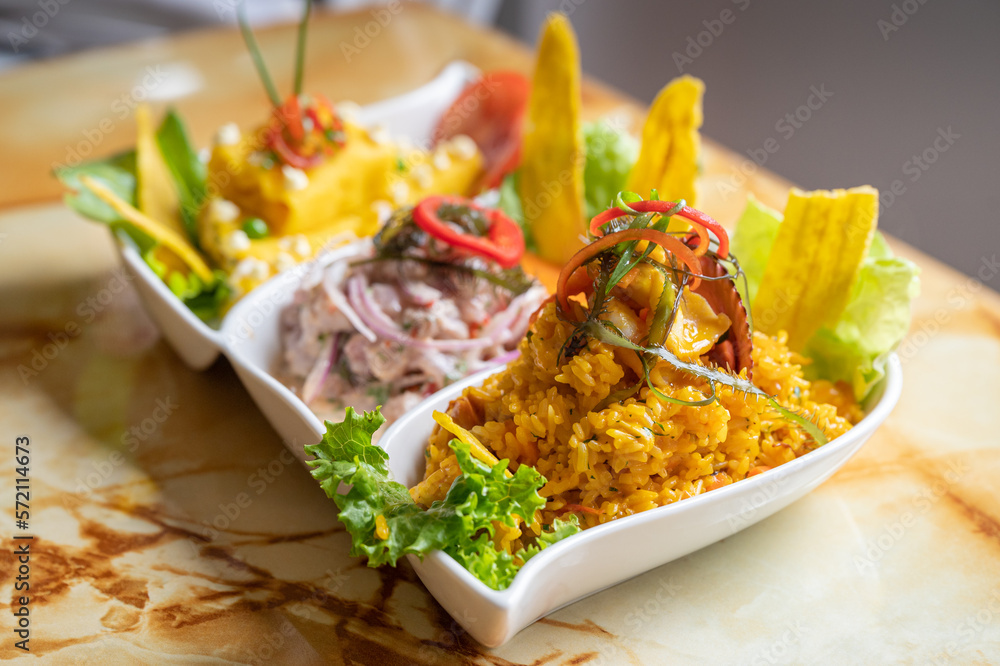 ceviche, arroz con marisco y causa foto de Stock | Adobe Stock
