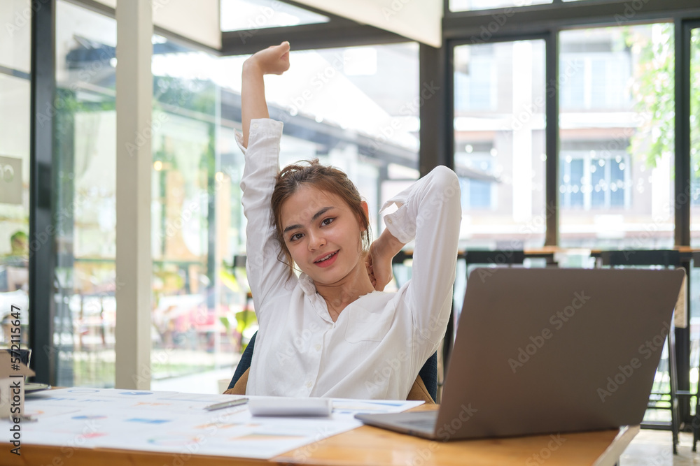 Calm hold hands with hands behind head relaxing in comfortable office chair, feels satisfied by work done.. Calm hold hands with hands behind head relaxing in comfortable office chair, feels satisfied by work done..