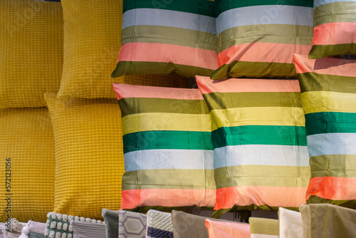 colorful cushions on shelves showcases