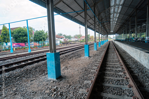 A station that is still very empty of passengers due to the effects of the covid 19 pandemic, the station sees few passengers arriving during certain hours at the Jombang station, East Java, Indonesia photo