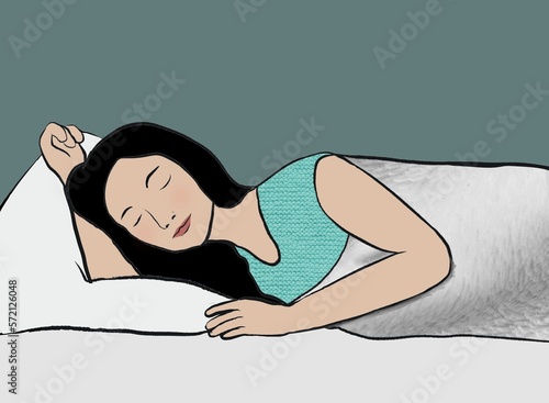 A young woman sleeping soundly on bed 