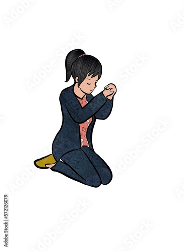 A Young Girl kneeling and Praying photo