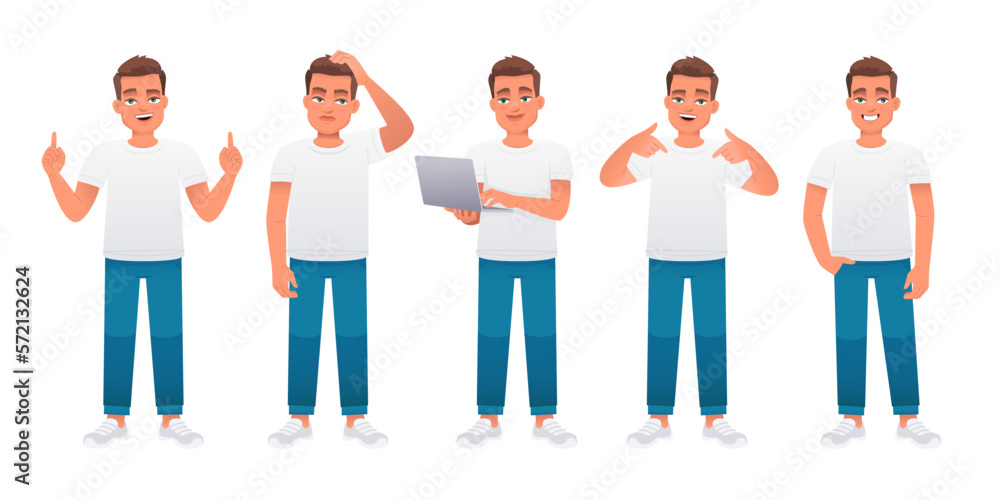 Obraz premium The guy stands radiating confidence, thoughtfully, with a laptop in his hands, points to something. A young caucasian male in a white t-shirt and blue jeans stands in various poses. 