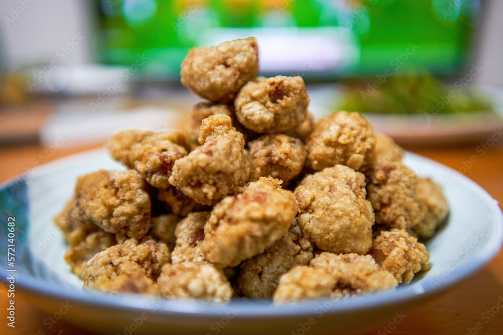 A plate of crispy and delicious fried crispy meat close-up A plate of crispy and delicious fried crispy meat close-up