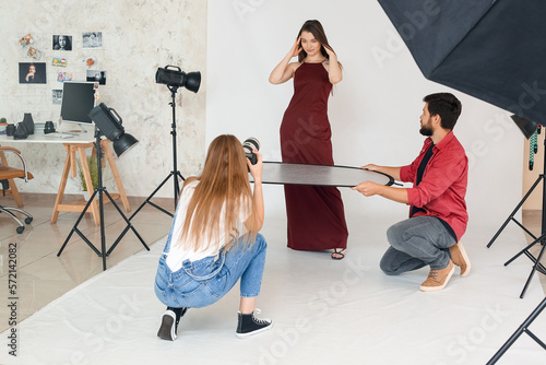 Female photographer and her...