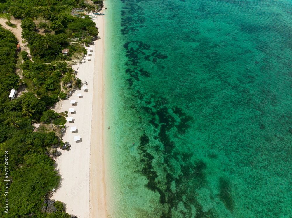 Aerial drone of tropical sandy beach and blue sea. Bantayan island, Philippines.