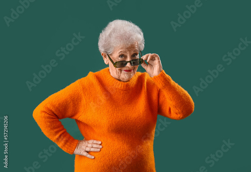Senior woman in sunglasses ...