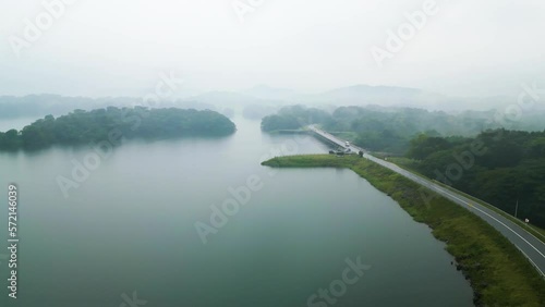 Aerial view above Loggal Oya Lake in nature reservoir of Sri Lanka during rainy day photo