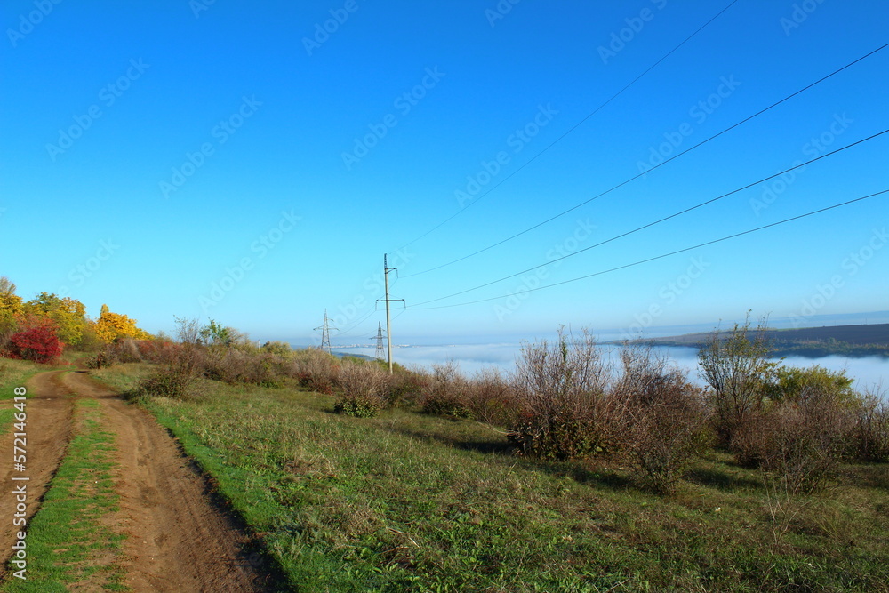 road in the countryside near high voltage lines